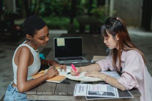 two people studying together